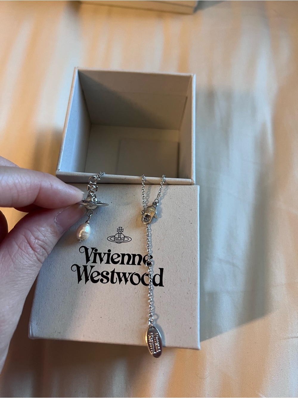 Vivienne Westwood Claude Emiliana Silver and White Pearl Charm Necklace - Picture 8 of 9